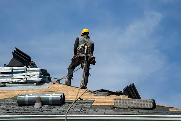 Professional Roofing technician working in Charlton City, MA